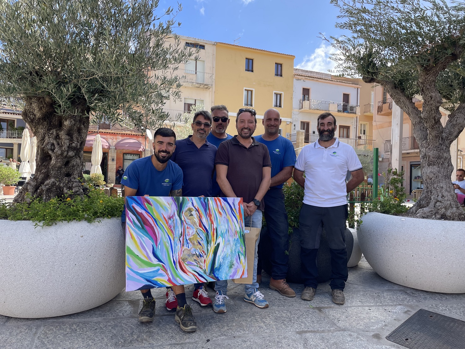 Il team di Sgaravatti group vincitori della 10° edizione di Estate in Fiore con il delegato Occhioni
